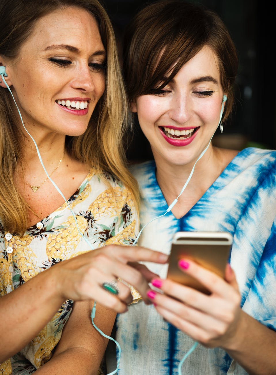 Two girls talking on phone