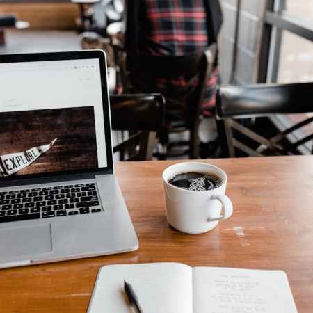 writing in a coffee shop