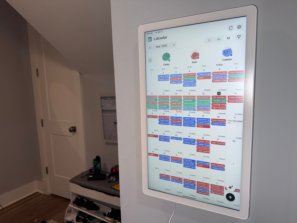 A photo of the Cozyla+2 Calendar on a wall.