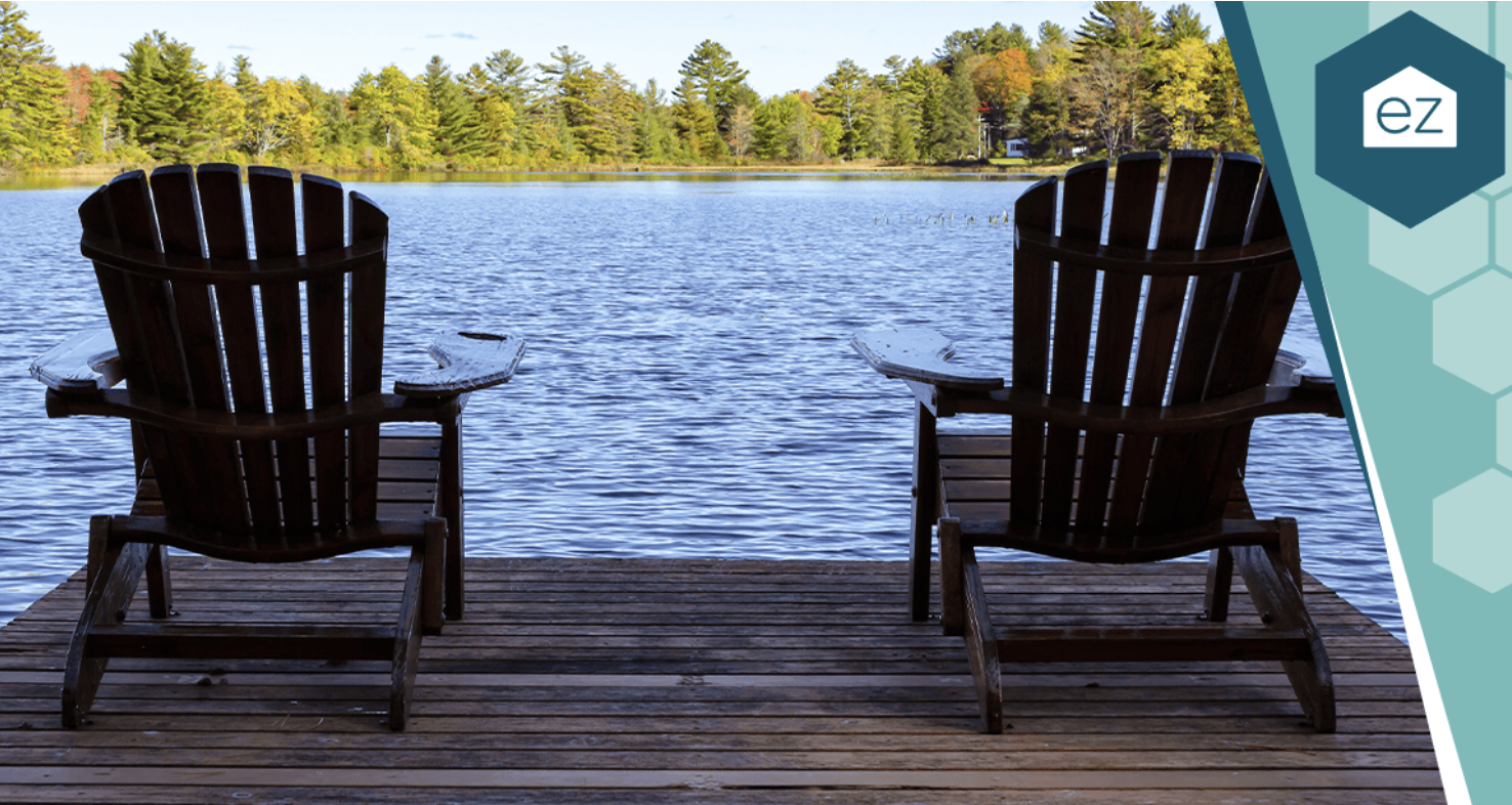 image of chairs facing a lake